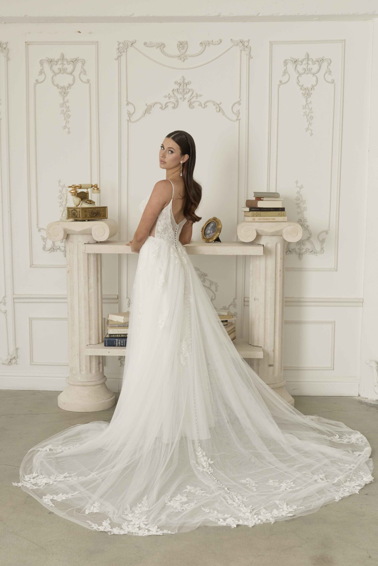 Romantic a-line blush wedding dress with floral design perfect for a barn or woodland wedding.