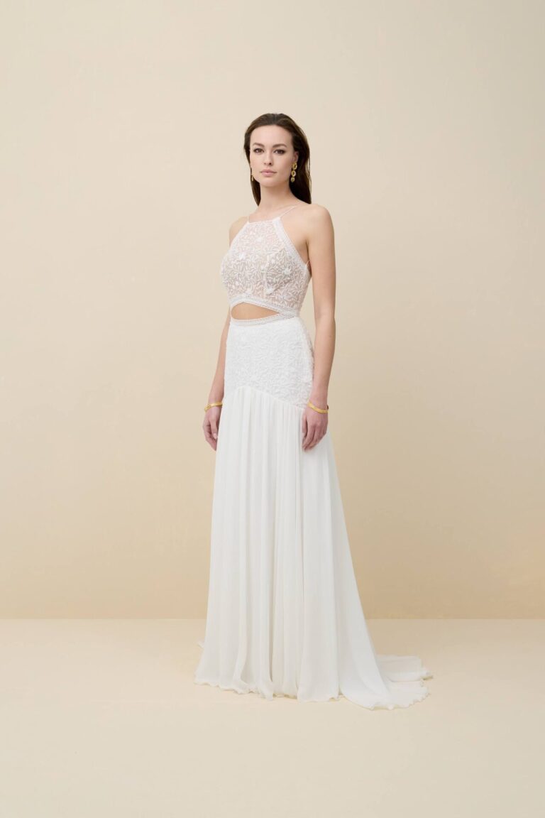 Boho spaghetti strap wedding dress with cutout and soft flowing skirt
