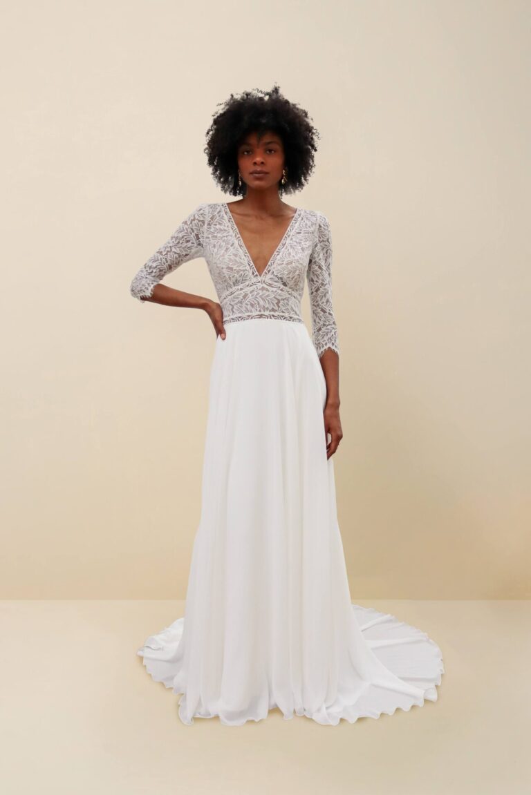 long sleeved lace wedding dress wit open back and boho style
