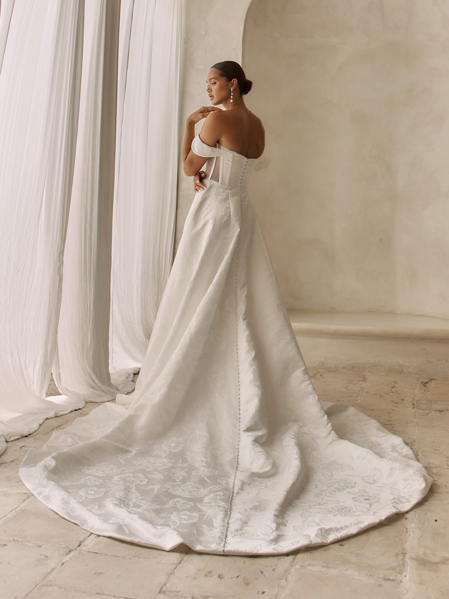 Josh wedding dress in floral jacquard with curved boned bodice