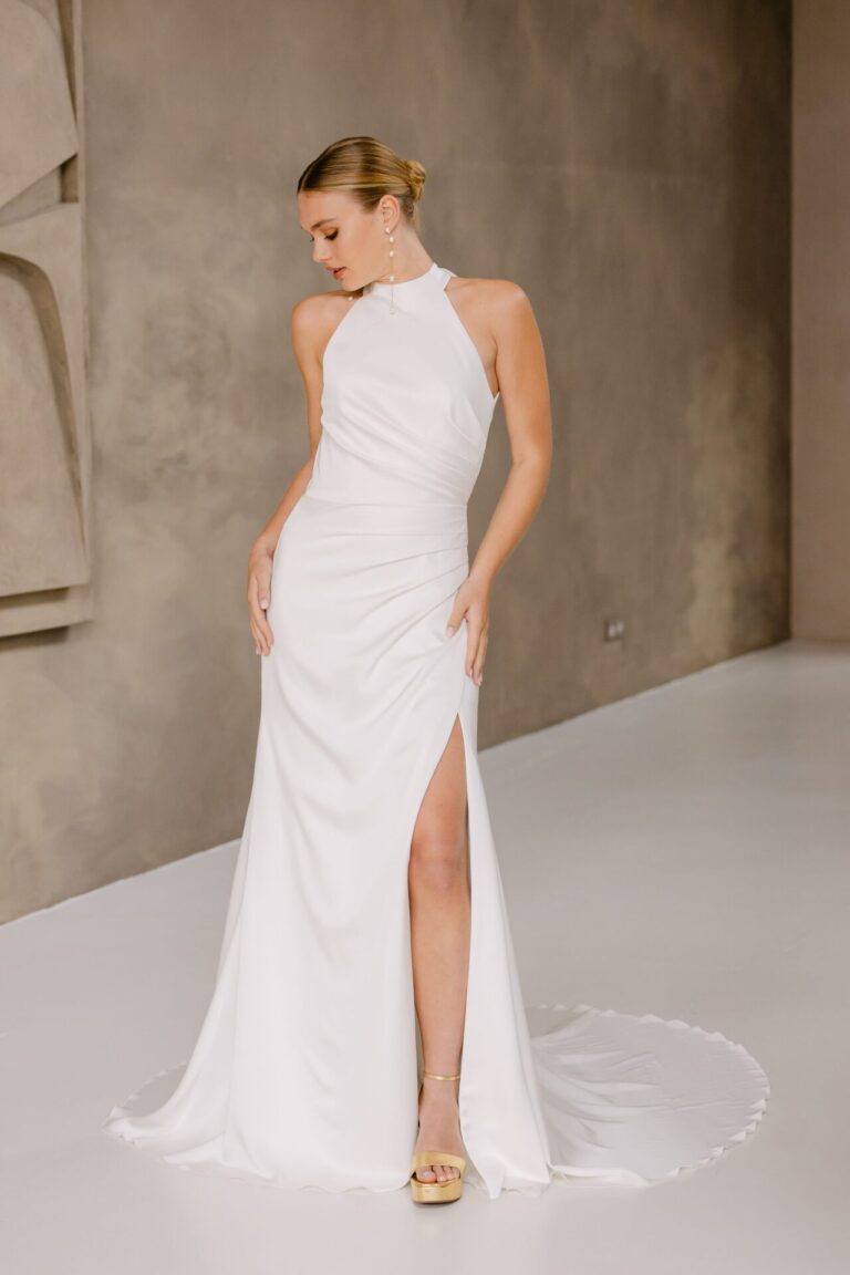 Alejandra wedding dress with asymmetric straps, open back and detachable bow
